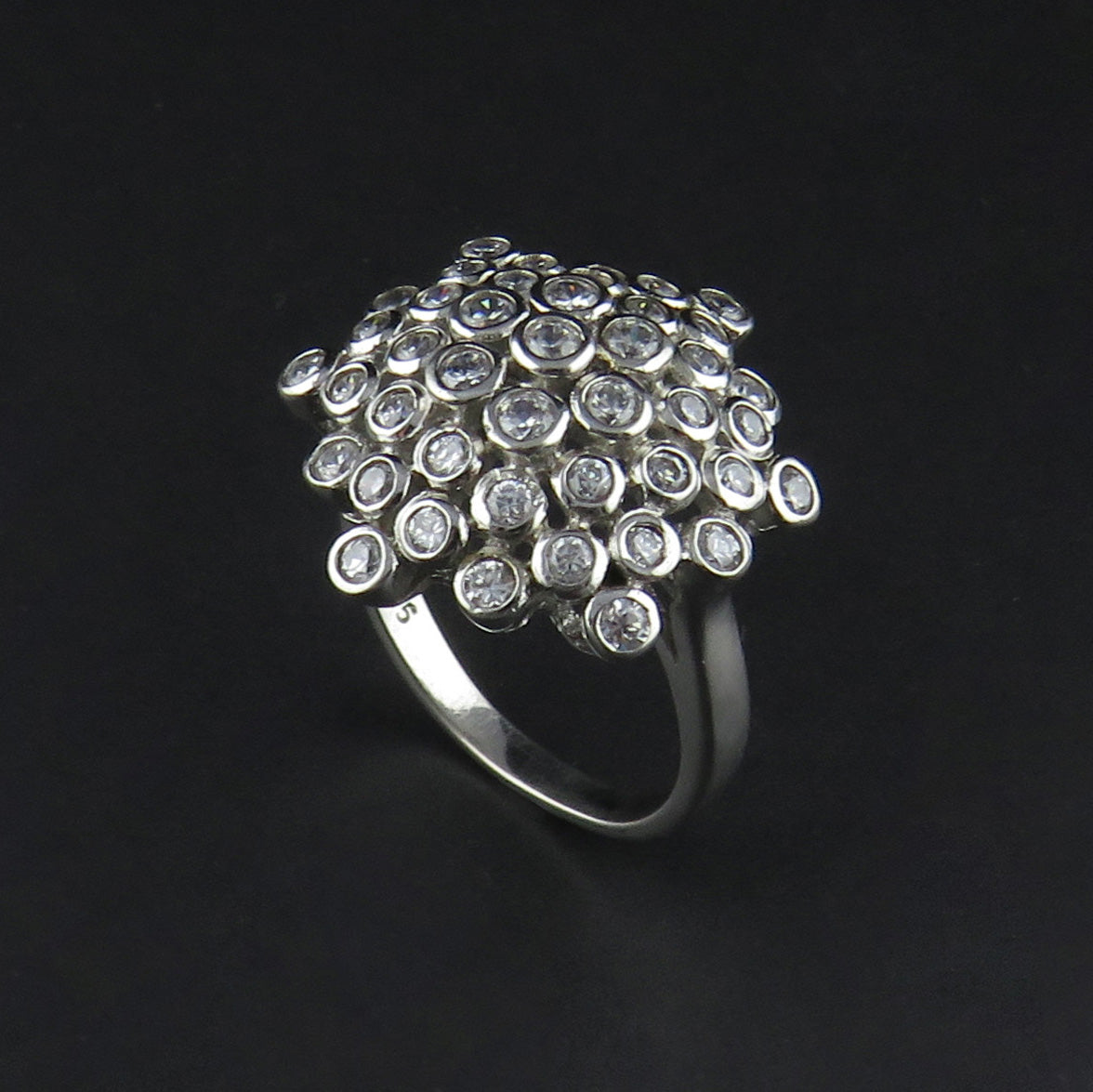 Cubic zirconia store cluster ring